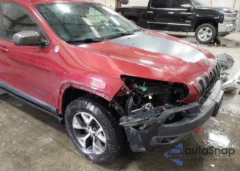 2015 Jeep Cherokee Trailhawk from USA, damaged, VIN 1C4PJMBS2FW635261